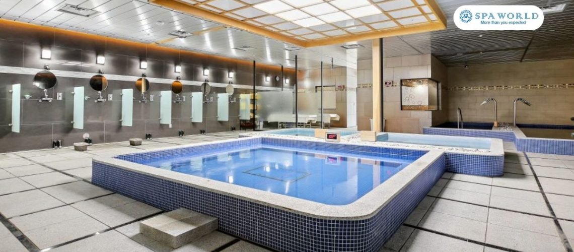 korean bath house with shower area - Spa World