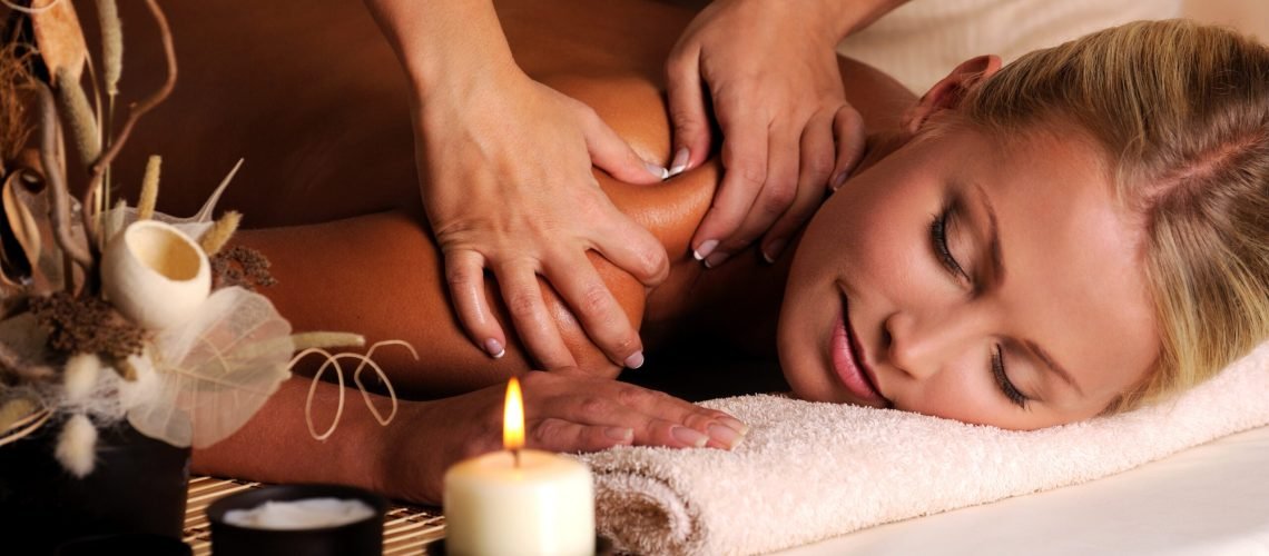 girl getting massage from an experienced massage therapist she found